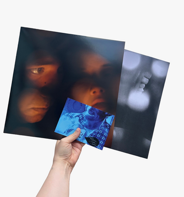 Vinyl LP with exclusive signed and inscribed postcard